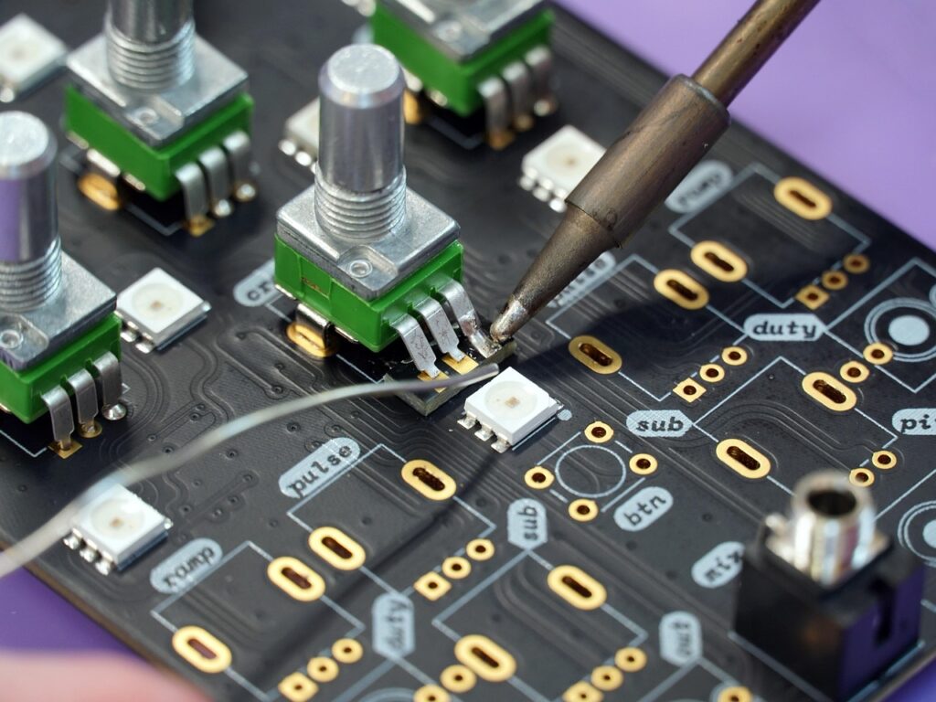Download free HD stock image of Soldering Electronics